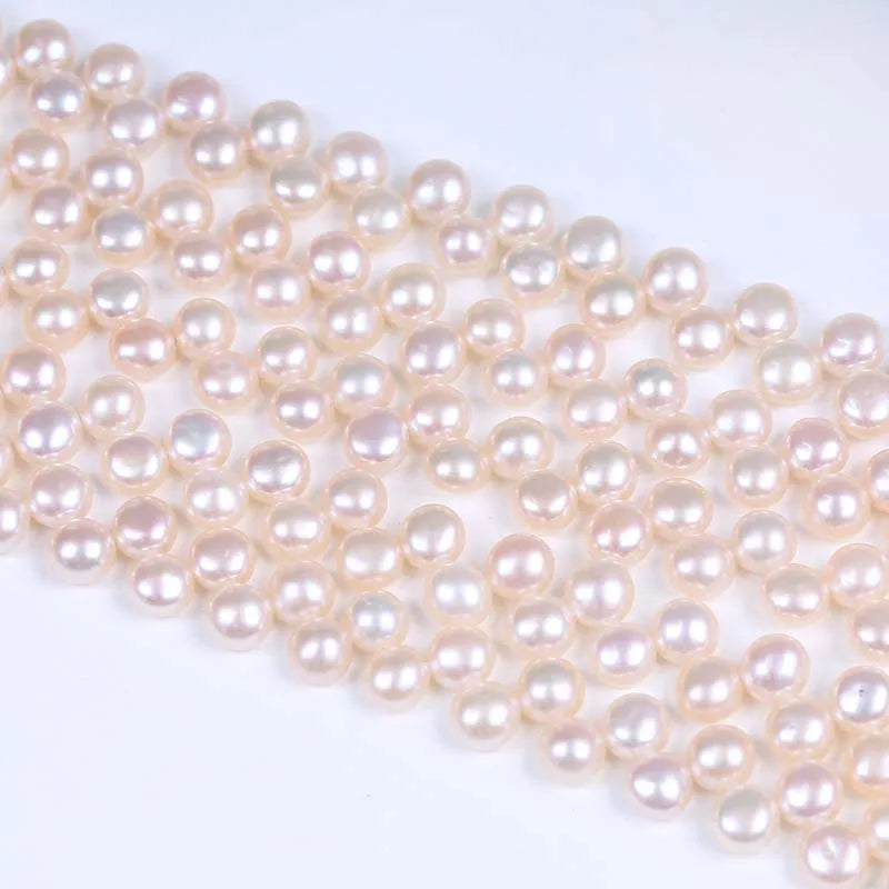 Freshwater Button Pearl Strand, AAA, 6-7mm top drilled