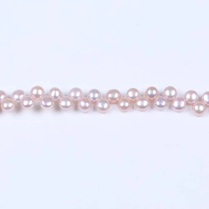 Freshwater Button Pearl Strand, AAA, 6-7mm top drilled