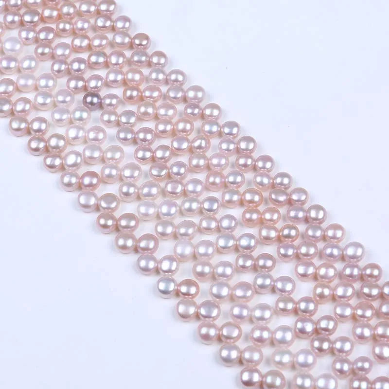 Freshwater Button Pearl Strand, AAA, 6-7mm top drilled